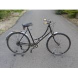 A c1925 Le Chemineau of St Etienne. A lady's bicycle with original black enamel finish with signs of