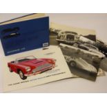 Aston Martin DB4 Sales Brochure 4pp in clean condition, some light creasing. Also, a handbook for