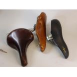 A Brooks 'Professional' Lightweight Saddle and a 'Professional S', together with a foam rubber