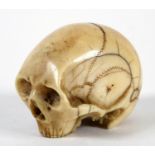 CARVED IVORY SKULL - MEMENTO MORI 18th or 19thc, a detailed small carved ivory skull with small hole
