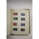 STAMP ALBUMS including a Tower Stamp Album, with GB QEII, George V and VI used stamps and mint,