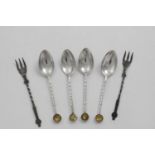 A SET OF FOUR SCOTTISH PROVINCIAL COFFEE SPOONS with twist stems and citrine-set terminals, by