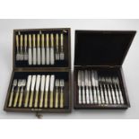 A GEORGE V CASED SET OF TWELVE IVORY HANDLED FISH KNIVES AND TEN FISH FORKS by Charles Boyton &