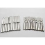 A GEORGE V SET OF TWELVE PAIRS OF DESSERT OR FRUIT KNIVES AND FORKS with Old English pattern