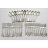 NEWCASTLE FLATWARE:- A set of twelve early Victorian Fiddle pattern dessert forks by Reid and