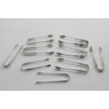 NINE ASSORTED PAIRS OF SUGAR TONGS in a variety of patterns, some initialled, mixed dates &