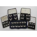 A GEORGE V CASED SET OF TWELVE TEA SPOONS by J. Ramsay, London 1918, two cased sets of six tea