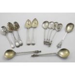 FIVE VARIOUS LATER-DECORATED OR "BERRY" TABLE SPOONS (two with initials), a Victorian fruit