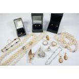 A QUANTITY OF JEWELLERY including three cultured pearl bracelets with 18ct gold clasps, a cultured