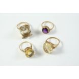AN AMETHYST SINGLE STONE RING the oval-shaped amethyst is set in 9ct gold, size O 1/2, together with