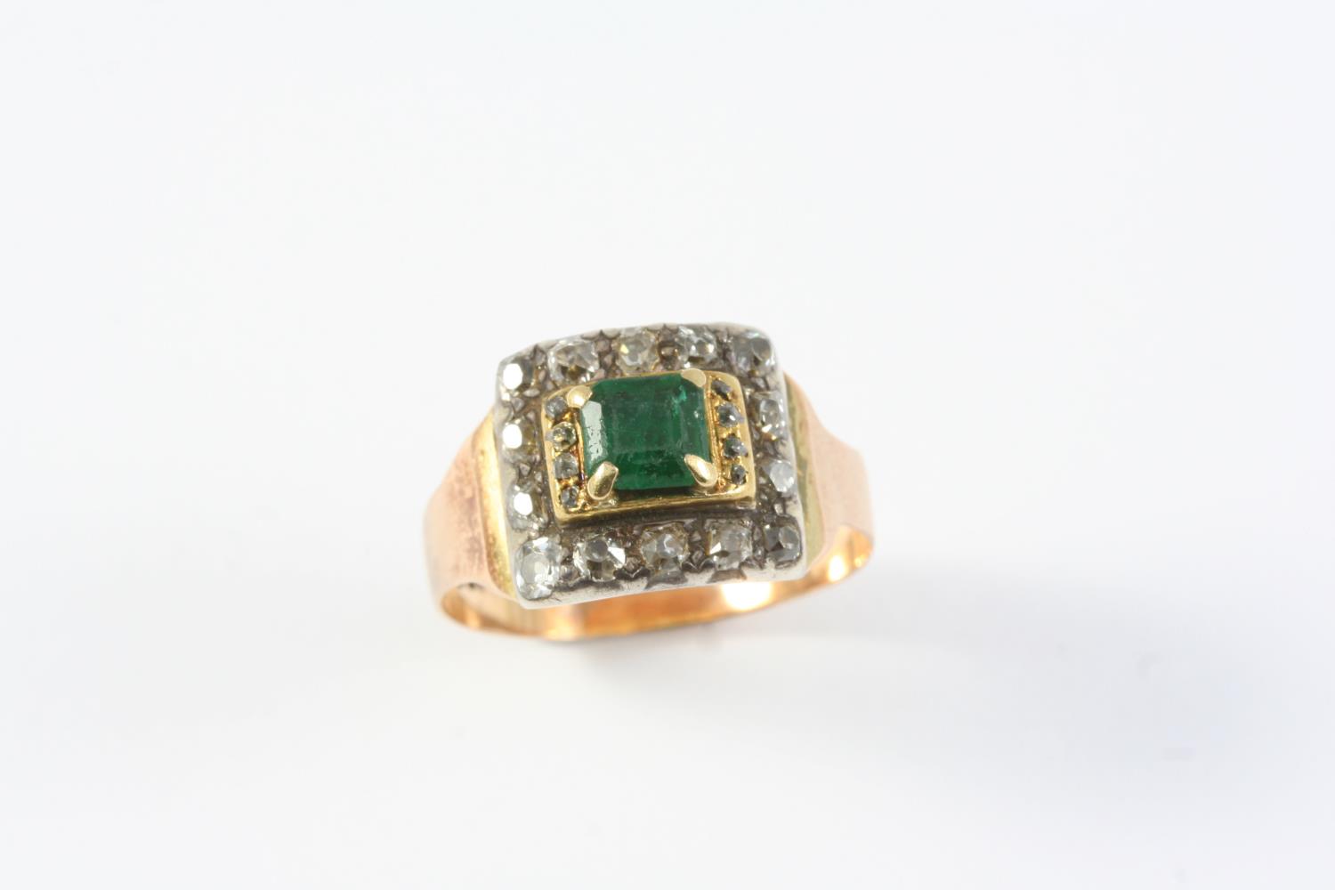 A GEORGE III EMERALD AND DIAMOND RING the square-shaped emerald is set within a surround of rose-cut