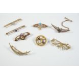 A QUANTITY OF ASSORTED BROOCHES including a ruby and diamond star and crescent brooch, set in