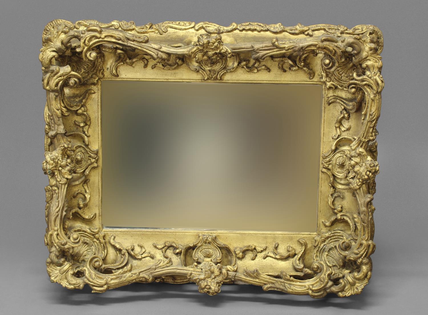 AN ELABORATE LATE 19TH CENTURY STYLE WALL MIRROR. An elaborate rectangular wall mirror with a - Image 2 of 2