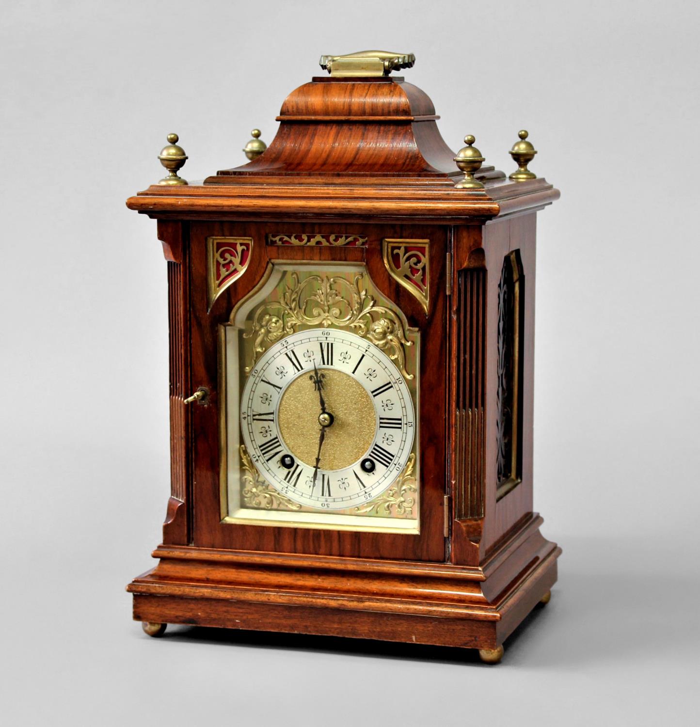 A WALNUT AND BRASS MOUNTED MANTEL CLOCK, late 19th century, the brass dial with a 4 1/2" silvered - Image 2 of 2