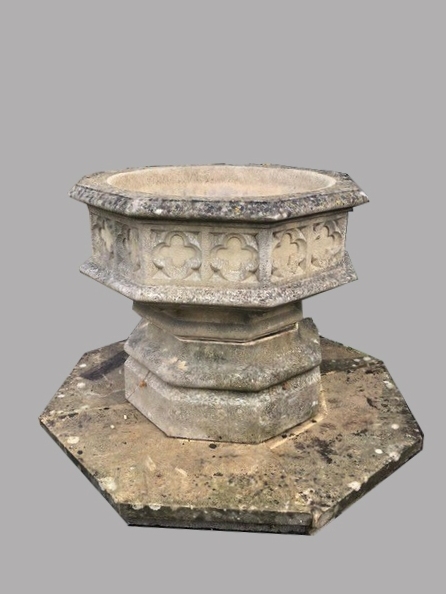 A LARGE COMPOSITION STONE GOTHIC REVIVAL URN. The urn with a broad dished top with quatrefoil cast