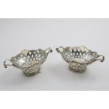 A PAIR OF EARLY VICTORIAN BONBON DISHES in the style of 18th century Dutch baskets with