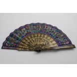 A LATE 19TH CENTURY CHINESE PAINTED FAN with lacquered sticks, each side with a multitude of