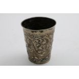 A LATE 17TH / EARLY 18TH CENTURY SCANDINAVIAN / BALTIC BEAKER of tapering form with embossed