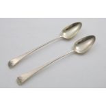 A PAIR OF GEORGE III OLD ENGLISH PATTERN BASTING OR SERVING SPOONS with engraved crest and script