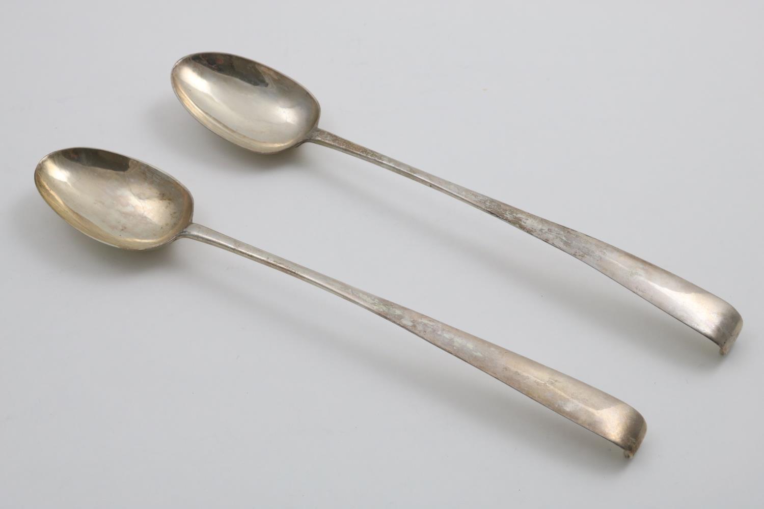 A PAIR OF GEORGE III IRISH HOOK-END BASTING OR SERVING SPOONS by John Craig, Dublin 1775; 13.1" (