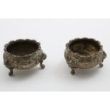 A PAIR OF WILLIAM IV IRISH SALTS with chinoiserie decoration, chased around the sides with buildings