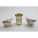 A MIXED LOT:- A pair of Elizabeth II sauce boats on 3 legs, by R.W. Burbridge, Sheffield 1961 and an