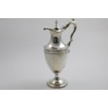 A GEORGE III VASE-SHAPED EWER OR JUG with borders of bright-cutting and beading, the handle (now