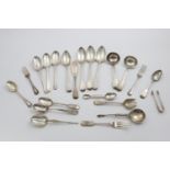 A MIXED LOT OF FLATWARE:- A pair of George IV Fiddle pattern sauce ladles, seven table spoons, a