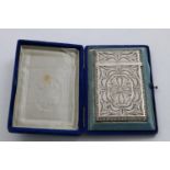 A 19TH CENTURY FILIGREE-WORK CARD CASE with a hinged cover and a cartouche on top, inscribed "