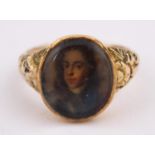 A GOLD RING set with a miniature portrait of a man, possibly the Duke of Marlborough or The Young