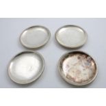 A SET OF FOUR MID 20TH CENTURY FRENCH SMALL CIRCULAR DISHES with collet feet and pelleted borders,