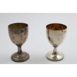 A GEORGE III WINE GOBLET plain with a gilt interior and a reeded border around the foot, by John