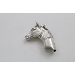 A VICTORIAN CAST WHISTLE modelled as the head and neck of a thoroughbred horse with ears pricked and