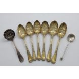 SIX LATER-DECORATED ANTIQUE TABLE SPOONS with chasing and parcel-gilding (for use as fruit serving