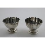 A PAIR OF EDWARDIAN SMALL ROSE BOWLS with shaped and moulded rims, by A & J. Zimmerman, Birmingham