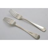 BY PAUL STORR:- A pair of George III table forks, Old English pattern, initialled "EJB",