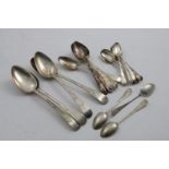 A SET OF SEVEN GEORGE III SCOTTISH TEA SPOONS & a matched set of four table spoons, all by Alexander