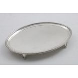 A GEORGE III NAVETTE-SHAPED SALVER with a reeded border and reeded bracket feet, by J. Crouch &