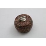 A LATE VICTORIAN MOUNTED PINK GRANITE PAPERWEIGHT in the form of a curling stone, by Kirwan and