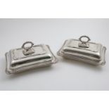 A PAIR OF EDWARDIAN CUSHION-SHAPED ENTREE DISHES & COVERS rectangular with gadrooned borders,