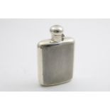 AN ART DECO LARGE SPIRIT FLASK of rounded rectangular outline, with an engine-turned front & back