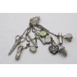 A VICTORIAN CHATELAINE CLIP with ten chains dependant, by W.F. Garrud, London 1888 with twelve