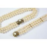 A THREE ROW UNIFORM CULTURED PEARL CHOKER the pearls measure approximately 7.3mm and are set to a