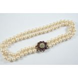A CULTURED PEARL AND AMETHYST DOUBLE ROW UNIFORM CHOKER NECKLACE the pearls measure approximately
