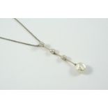 A DIAMOND AND PEARL NECKLET formed with three cushion-shaped diamonds on knife-edge setting,