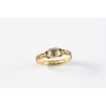 A GEORGE II ROCK CRYSTAL SET RING the cushion-shaped rock crystal is set in gold closed back