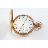 A 9CT GOLD HALF HUNTING CASED POCKET WATCH the white enamel dial with Roman numerals and