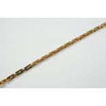 AN 18CT GOLD FANCY LINK BRACELET formed with rectangular-shaped links, with concealed clasp, 19.