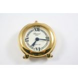 A GOLD PLATED HAPPY DAY ALARM DESK CLOCK BY CHOPARD the signed white dial with Roman quarters,