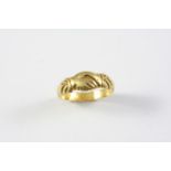 AN EARLY 18TH CENTURY GOLD FEDE RING formed with two clasping hands, circa 1720. Size M